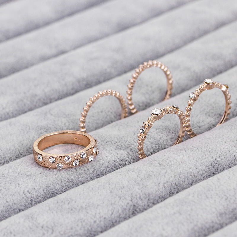 Joyas europeas y americanas diamantes apilables de oro rosa juego de cinco conjuntos de anillos bohemios