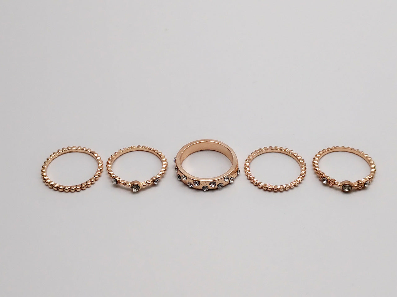 Joyas europeas y americanas diamantes apilables de oro rosa juego de cinco conjuntos de anillos bohemios