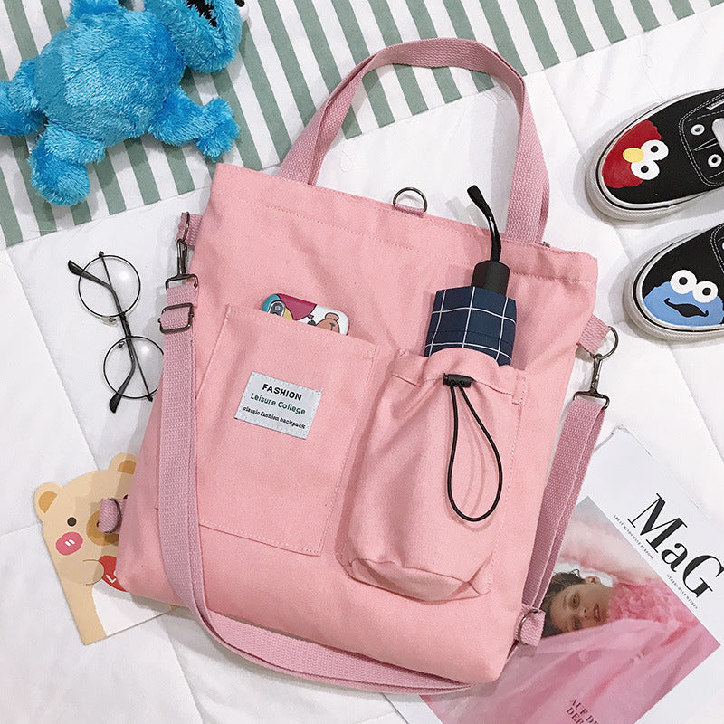 Bolso de lona cuadrado para mujer con un hombro inclinado
