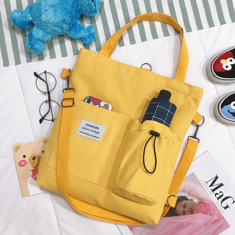 Bolso de lona cuadrado para mujer con un hombro inclinado
