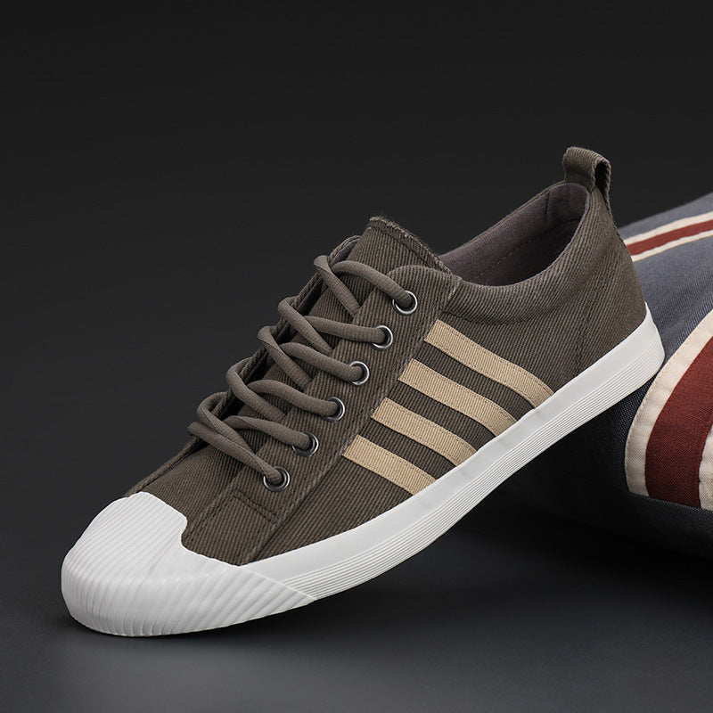 Zapatillas de hombre de primavera vulcanizadas zapatillas de lona antideslizantes suela de goma pisos de calidad elásticos Zapatos de hombre 5 colores 38-44