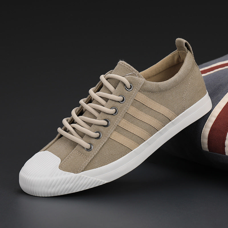 Zapatillas de hombre de primavera vulcanizadas zapatillas de lona antideslizantes suela de goma pisos de calidad elásticos Zapatos de hombre 5 colores 38-44