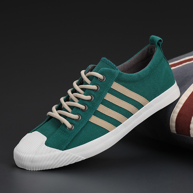 Zapatillas de hombre de primavera vulcanizadas zapatillas de lona antideslizantes suela de goma pisos de calidad elásticos Zapatos de hombre 5 colores 38-44