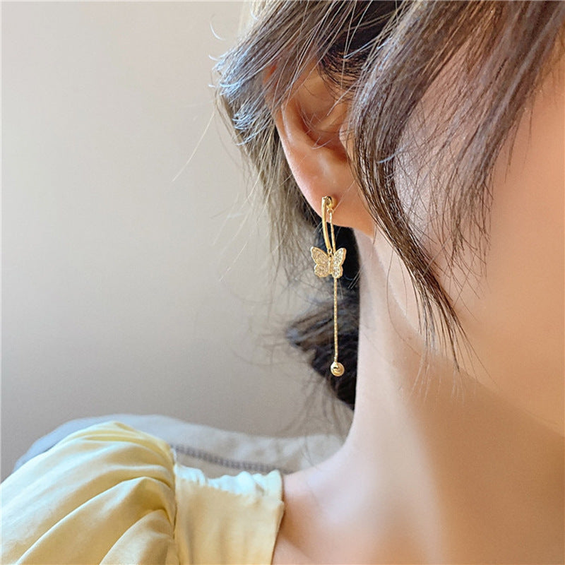 Pendientes de mariposa Premium con borla