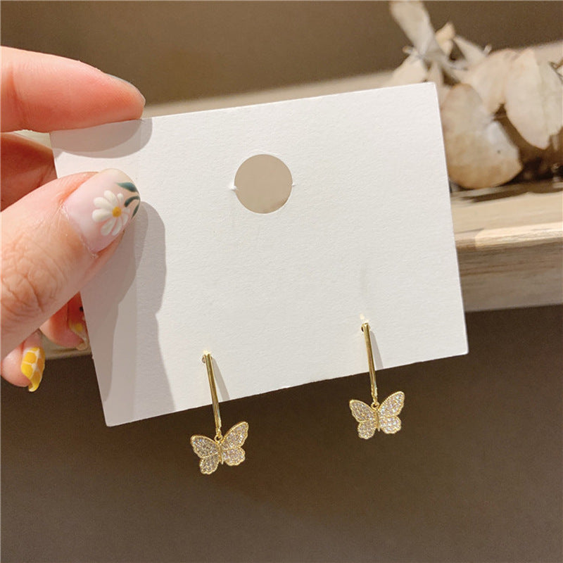 Pendientes de mariposa Premium con borla