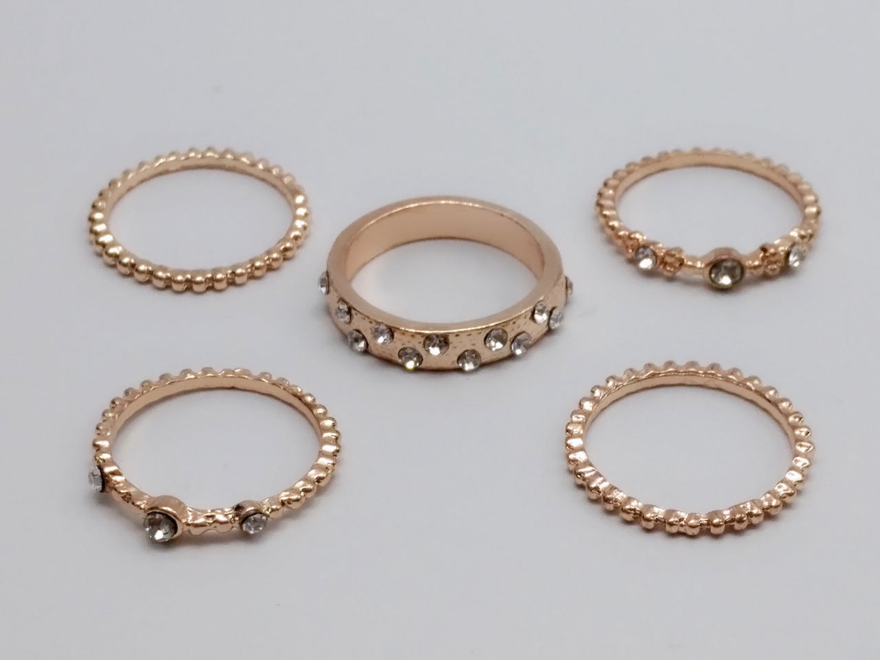 Joyas europeas y americanas diamantes apilables de oro rosa juego de cinco conjuntos de anillos bohemios