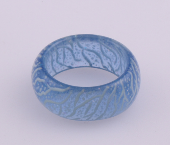 Anillo de resina luminoso de moda