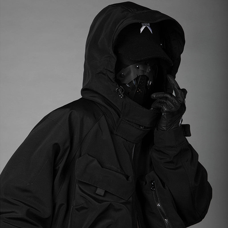 Man With Hooded Tooling And Three-dimensional Multi-pocket Jacket