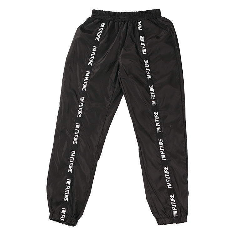 Pantalones casuales de alfabeto con puntadas de cinta