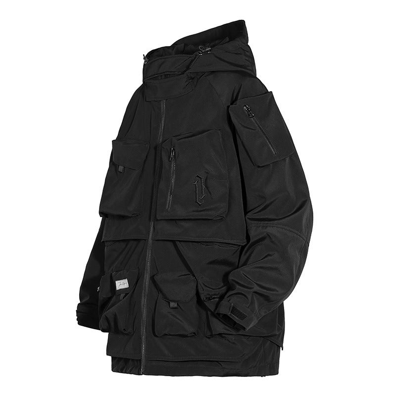 Man With Hooded Tooling And Three-dimensional Multi-pocket Jacket